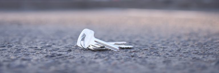 bunch-keys-lies-road-parking-lot-key-recovery-service-concept